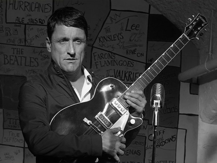 Daniel Taylor on the replica Cavern Club stage at The Beatles Story museum in Liverpool.