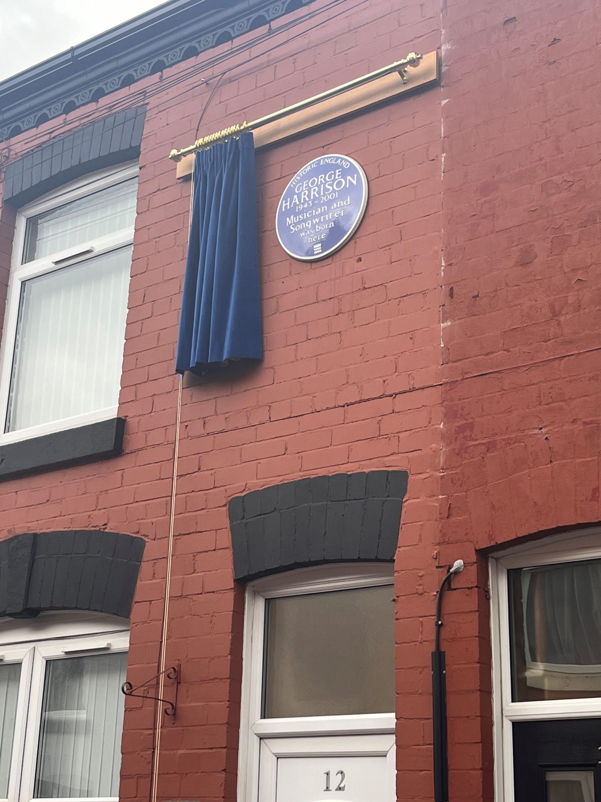 Olivia Harrison unveils a Blue Plaque at George Harrison's childhood home
